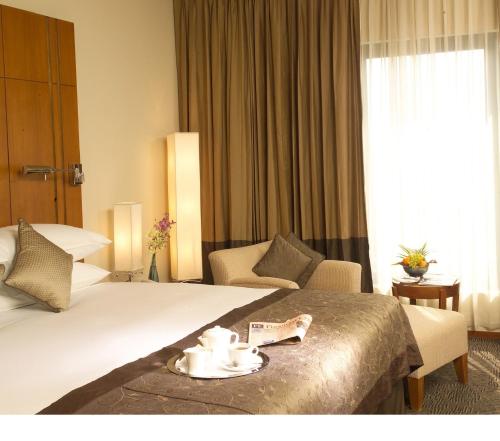 Imagen de la habitación del Hotel Radisson Blu Dhaka Water Garden. Foto 9