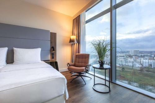 Imagen de la habitación del Hotel Radisson Blu Frankfurt. Foto 16