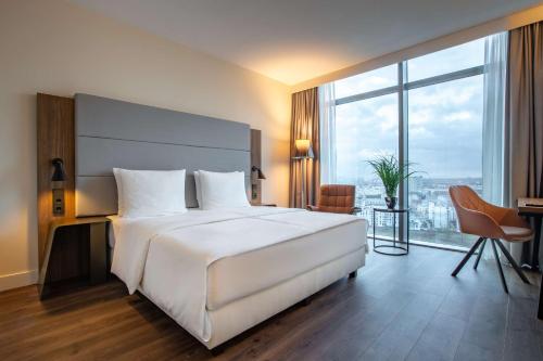 Imagen de la habitación del Hotel Radisson Blu Frankfurt. Foto 20