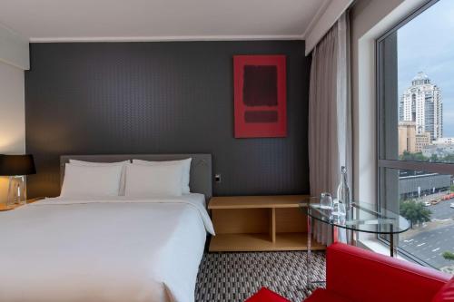 Imagen de la habitación del Hotel Radisson Blu Gautrain. Foto 13