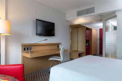 Imagen de la habitación del Hotel Radisson Blu Gautrain. Foto 14