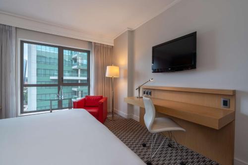 Imagen de la habitación del Hotel Radisson Blu Gautrain. Foto 15