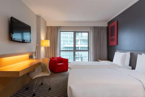 Imagen de la habitación del Hotel Radisson Blu Gautrain. Foto 19