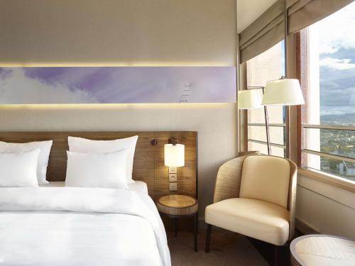 Imagen de la habitación del Hotel Radisson Blu Lyon. Foto 16