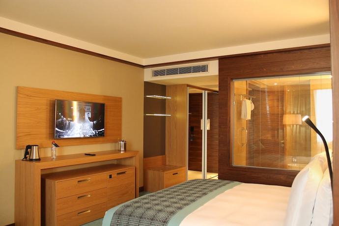 Imagen de la habitación del Hotel Radisson Blu M'Bamou Palace Hotel. Foto 10