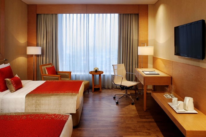 Imagen de la habitación del Hotel Radisson Blu New Delhi Dwarka. Foto 7