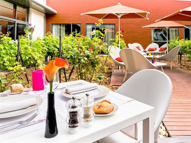 Imagen del bar/restaurante del Hotel Radisson Blu , Paris Boulogne. Foto 6