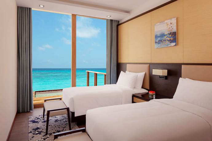 Imagen de la habitación del Hotel Radisson Blu Resort Maldives. Foto 12