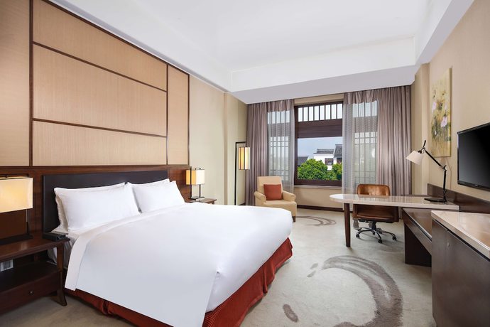 Imagen de la habitación del Hotel Radisson Blu Resort Wetland Park Wuxi. Foto 6