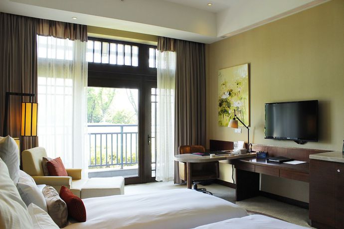 Imagen de la habitación del Hotel Radisson Blu Resort Wetland Park Wuxi. Foto 9