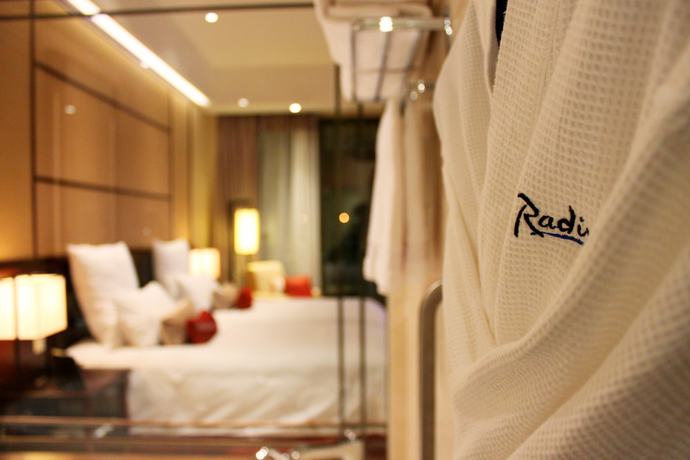 Imagen de la habitación del Hotel Radisson Blu Resort Wetland Park Wuxi. Foto 11