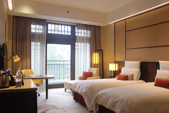 Imagen de la habitación del Hotel Radisson Blu Resort Wetland Park Wuxi. Foto 12