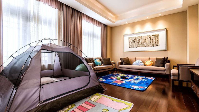 Imagen de la habitación del Hotel Radisson Blu Resort Wetland Park Wuxi. Foto 13
