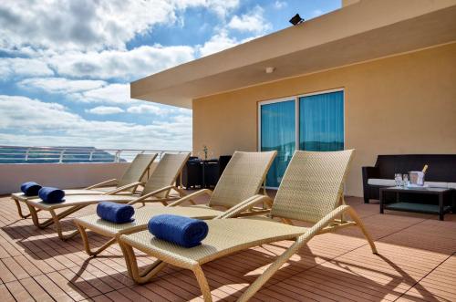 Imagen de la habitación del Hotel Radisson Blu Resort and Spa, Malta Golden Sands. Foto 13