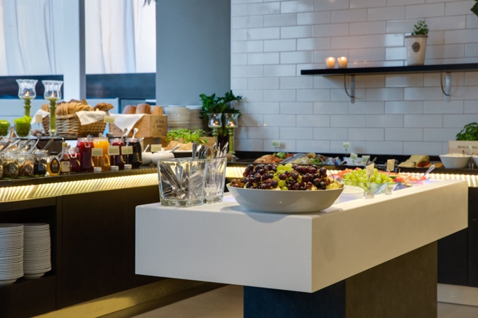 Imagen del bar/restaurante del Hotel Radisson Blu Royal Garden. Foto 3