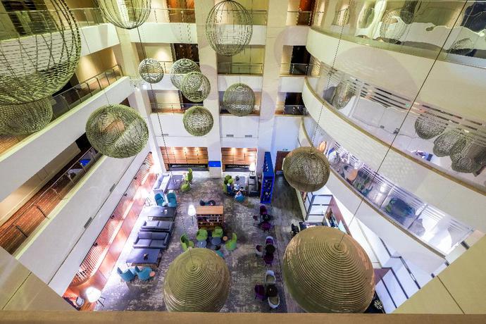 Imagen del bar/restaurante del Hotel Radisson Blu Sandton. Foto 5