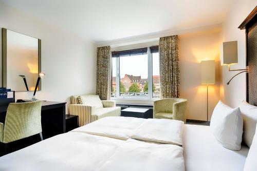 Imagen de la habitación del Hotel Radisson Blu Senator. Foto 16