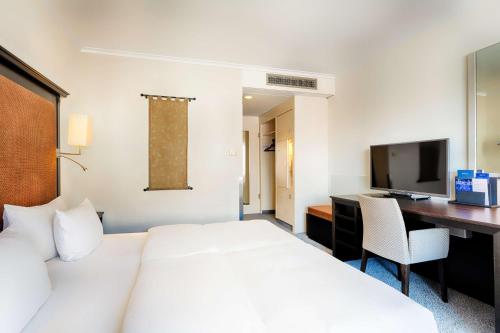 Imagen de la habitación del Hotel Radisson Blu Senator. Foto 18