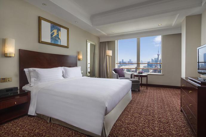 Imagen de la habitación del Hotel Radisson Blu Shanghai New World. Foto 2