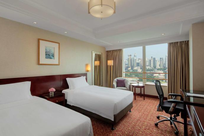 Imagen de la habitación del Hotel Radisson Blu Shanghai New World. Foto 5