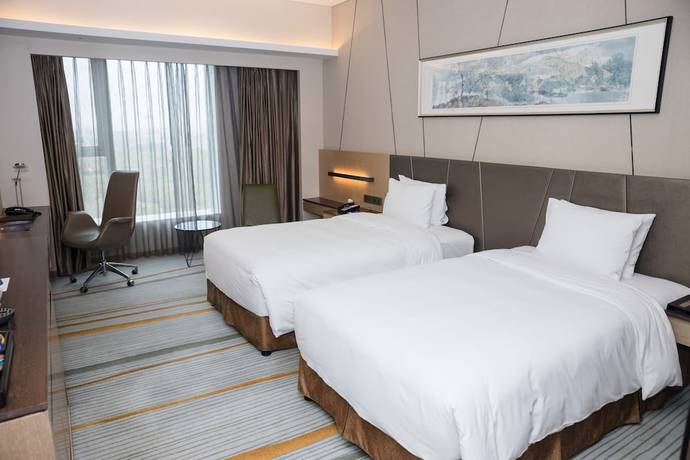 Imagen de la habitación del Hotel Radisson Blu Shanghai Pudong Jinqiao. Foto 14