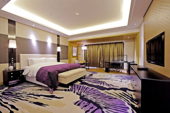 Imagen de la habitación del Hotel Radisson Blu Wuhan ETD Zone. Foto 9