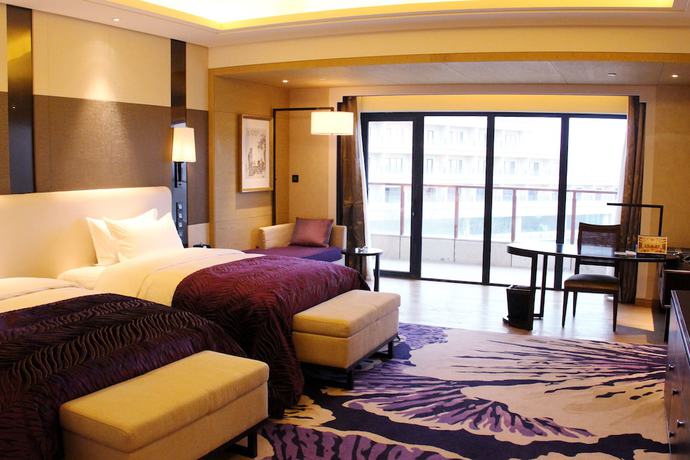 Imagen de la habitación del Hotel Radisson Blu Wuhan ETD Zone. Foto 10