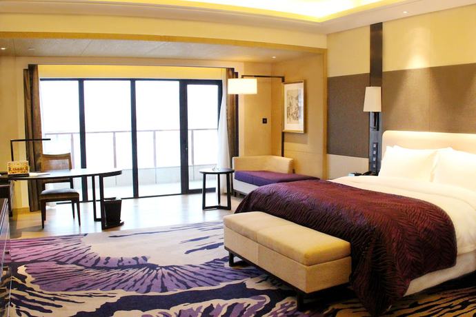 Imagen de la habitación del Hotel Radisson Blu Wuhan ETD Zone. Foto 11