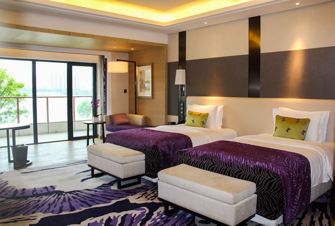 Imagen de la habitación del Hotel Radisson Blu Wuhan ETD Zone. Foto 16