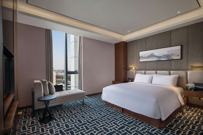 Imagen de la habitación del Hotel Radisson Blu Zhengzhou Huiji. Foto 16