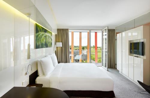 Imagen de la habitación del Hotel Radisson Blu & Convention Centre Kigali. Foto 4