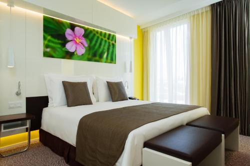 Imagen de la habitación del Hotel Radisson Blu & Convention Centre Kigali. Foto 5