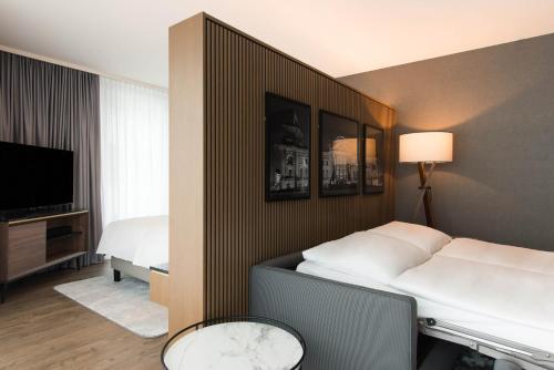 Imagen de la habitación del Hotel Radisson Collection Berlin. Foto 19