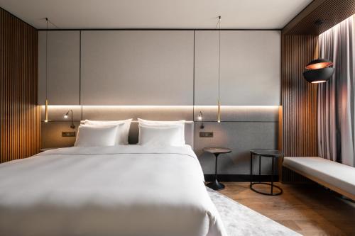 Imagen de la habitación del Hotel Radisson Collection Grand Place Brussels. Foto 20