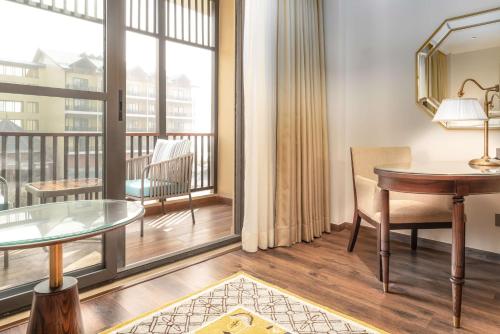 Imagen de la habitación del Hotel Radisson Collection Hotel & Spa, Riverfront Srinagar. Foto 14
