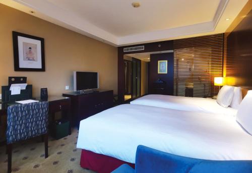 Imagen de la habitación del Hotel Radisson Collection Hyland Shanghai. Foto 19