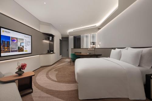 Imagen de la habitación del Hotel Radisson Collection Lingang Shanghai. Foto 19
