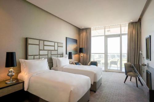 Imagen de la habitación del Hotel Radisson Dubai Damac Hills. Foto 8