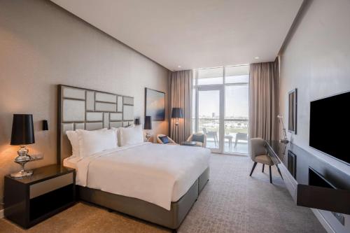 Imagen de la habitación del Hotel Radisson Dubai Damac Hills. Foto 9