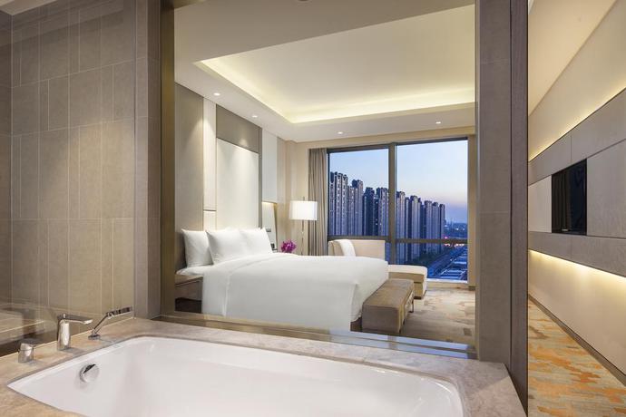Imagen de la habitación del Hotel Radisson Exhibition Center Shanghai. Foto 9
