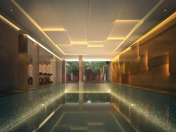 Imagen de la piscina del Hotel Radisson Exhibition Center Shanghai. Foto 17