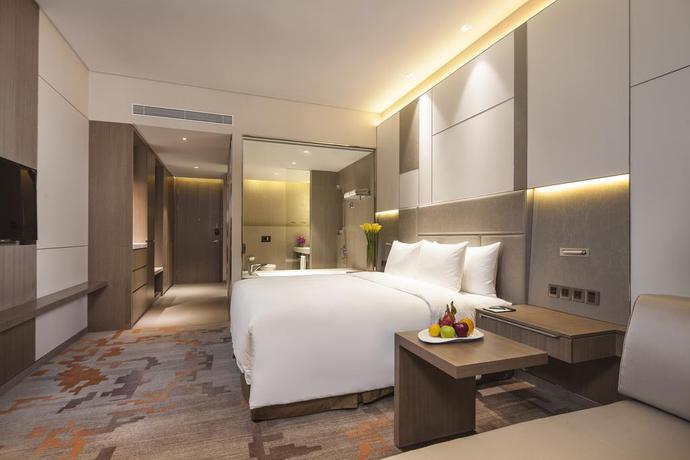 Imagen de la habitación del Hotel Radisson Exhibition Center Shanghai. Foto 16