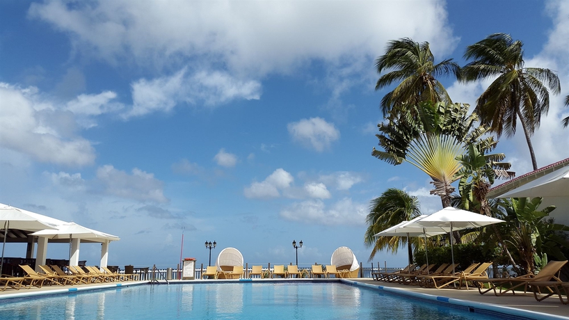 Imagen de la piscina del Hotel Radisson Grenada Beach Resort. Foto 13