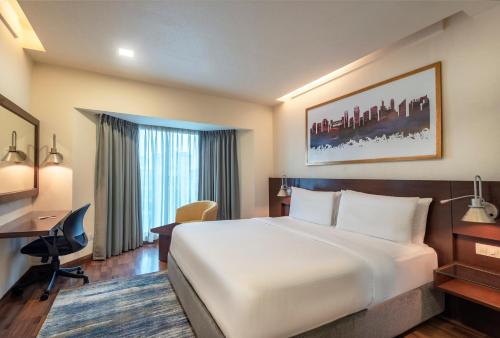 Imagen de la habitación del Hotel Radisson Gurugram Sohna Road City Center. Foto 4