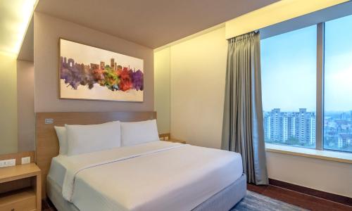 Imagen de la habitación del Hotel Radisson Gurugram Sohna Road City Center. Foto 7