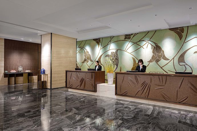 Imagen de los interiores del Hotel Radisson Hangzhou Qianjiang. Foto 12