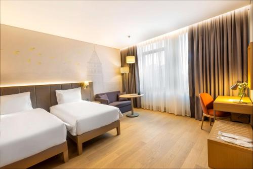 Imagen de la habitación del Hotel Radisson Hotel Istanbul Harbiye. Foto 16