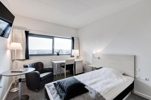 Imagen de la habitación del Hotel Radisson Hotel Papirfabrikken Silkeborg. Foto 15