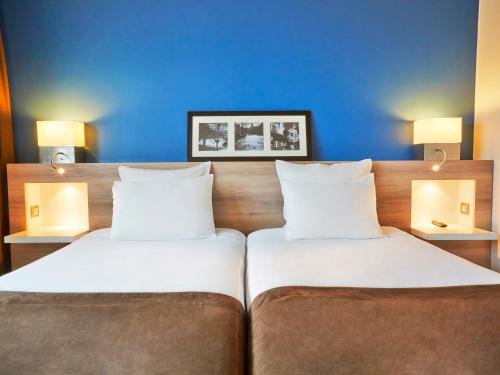 Imagen de la habitación del Hotel Radisson Hotel Paris Le Bourget. Foto 20