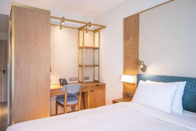 Imagen de la habitación del Hotel Radisson Hotel Saint Denis. Foto 12